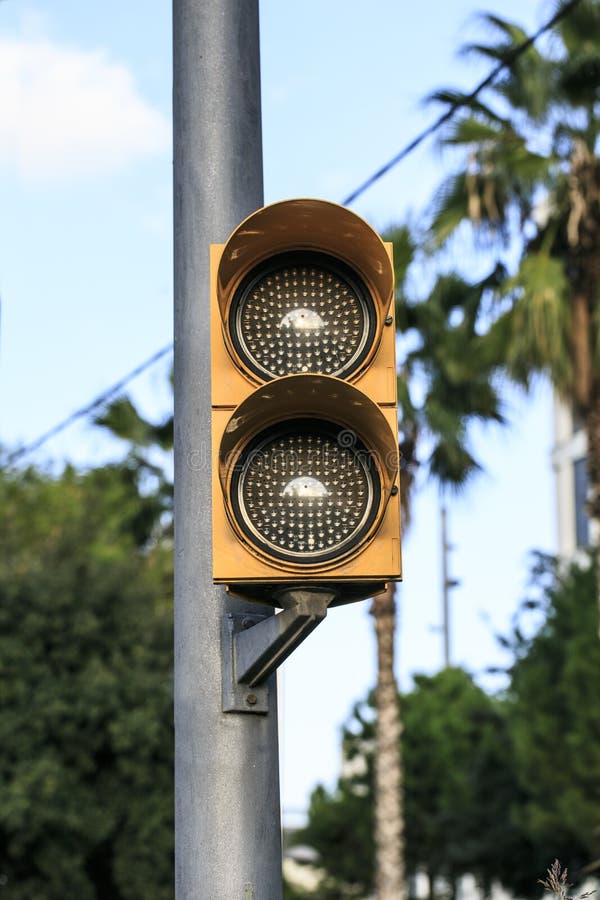 Illuminated Amber Yellow Traffic Light Stock Photos Free & Royalty