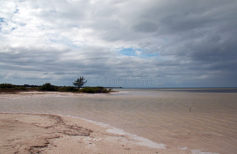 Isla Blanca beach under stormy skies on the Isla Blanca peninsula Cancun Mexico