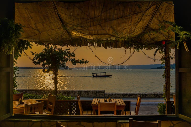 Dinner by the water sunset isla de flores guatemala island central america