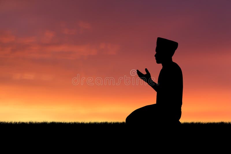 Man praying to allah god of Islam on sunset.