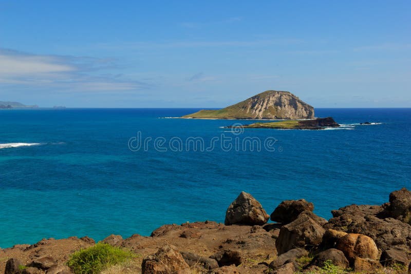 Island view with blue ocean water
