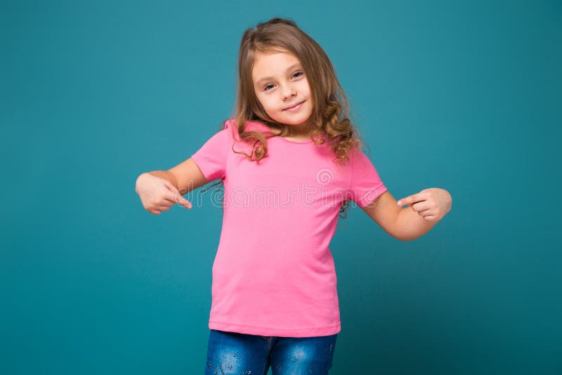Pretty, Little Girl in Tee Shirt with Brown Hair Stock Photo - Image of ...