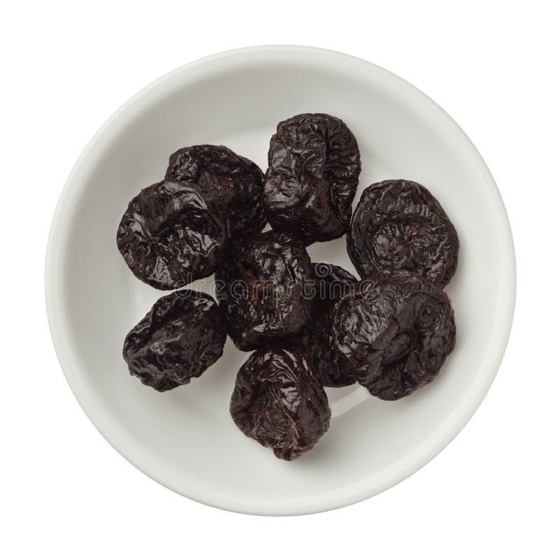 Isolated Dried Plums in a Bowl Over White Background Stock Image