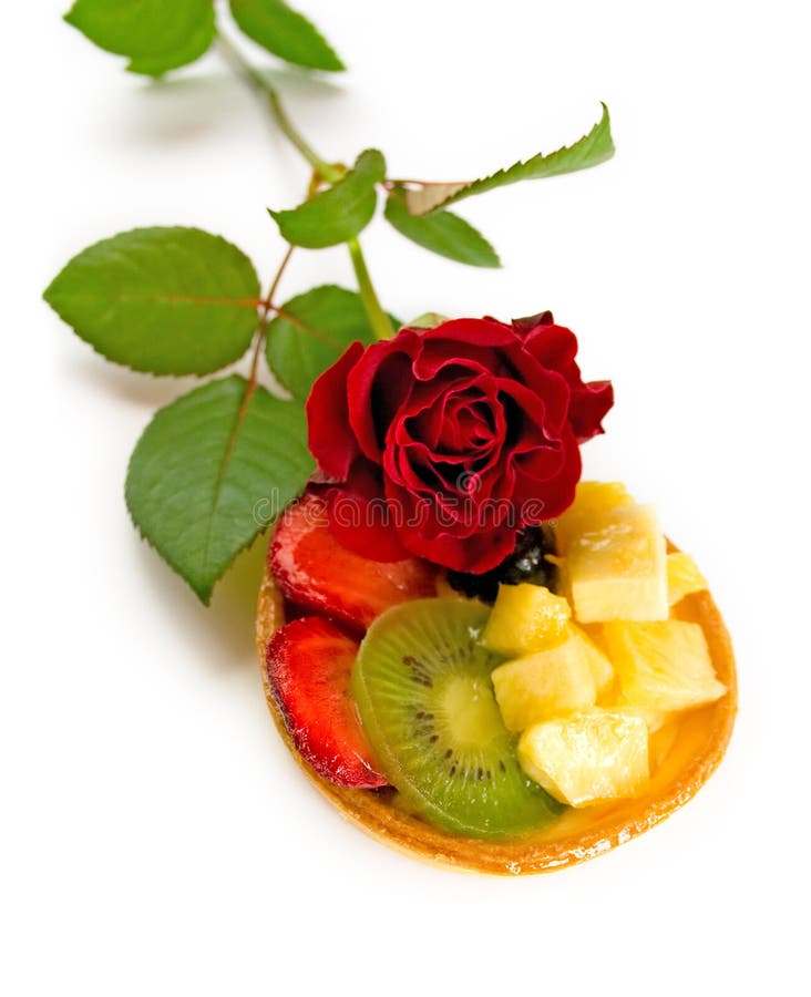 Isolated fruit cake with rose