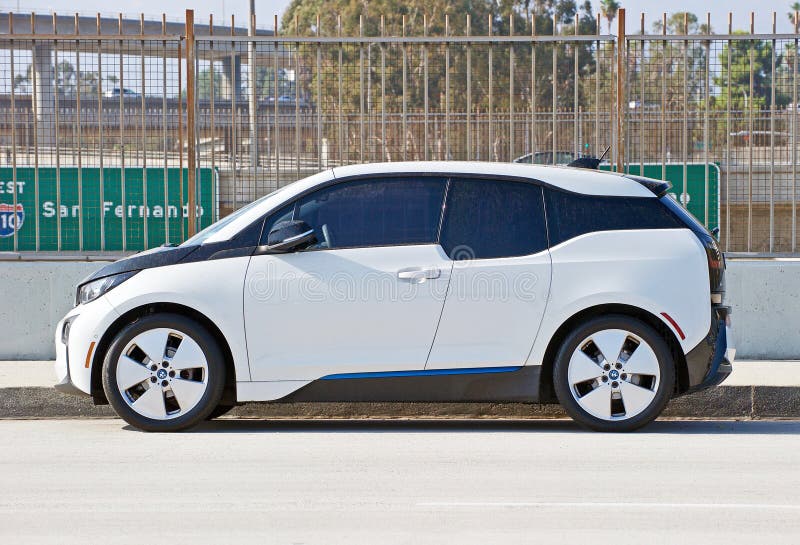 Isolated image of a late model BMW i3 parked along side the road in Old Town, Pasadena, California USA. Isolated image of a late model BMW i3 parked along side the road in Old Town, Pasadena, California USA