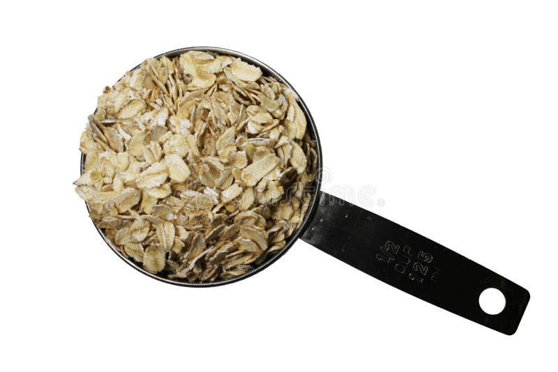 Dry rolled oats or oatmeal in a metal half-cup scoop isolated on white. Dry rolled oats or oatmeal in a metal half-cup scoop isolated on white