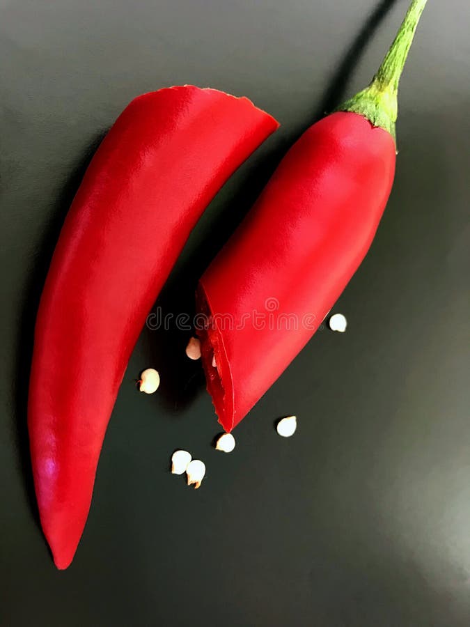 https://thumbs.dreamstime.com/b/isolated-object-red-bitter-hot-chili-pepper-cut-half-red-bitter-hot-chili-pepper-cut-half-124191731.jpg