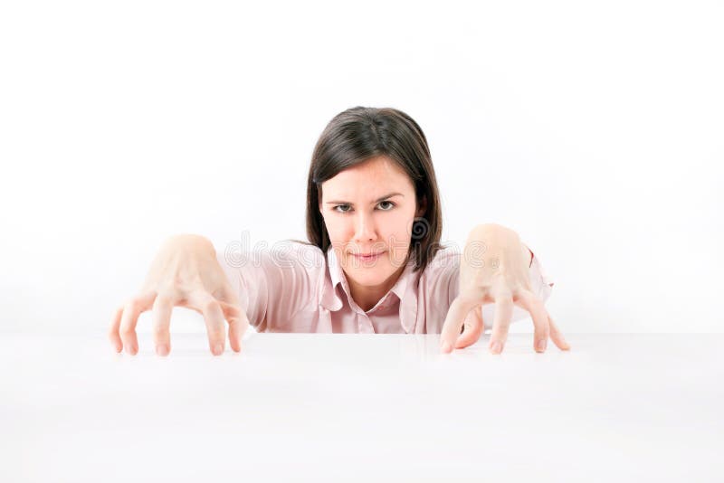 An isolated portrait of an angry business woman.