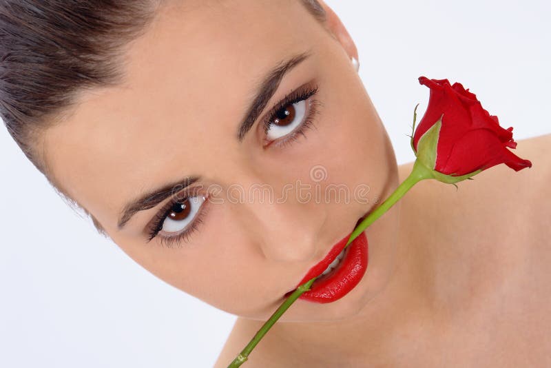 Isolated portrait of beauty with rose