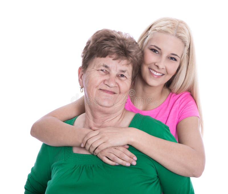 Isolated portrait of blond granddaughter hugging her grandmother