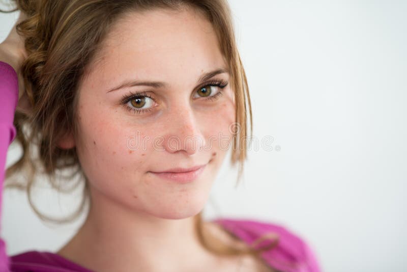 Isolated portrait of cheerful young teenager