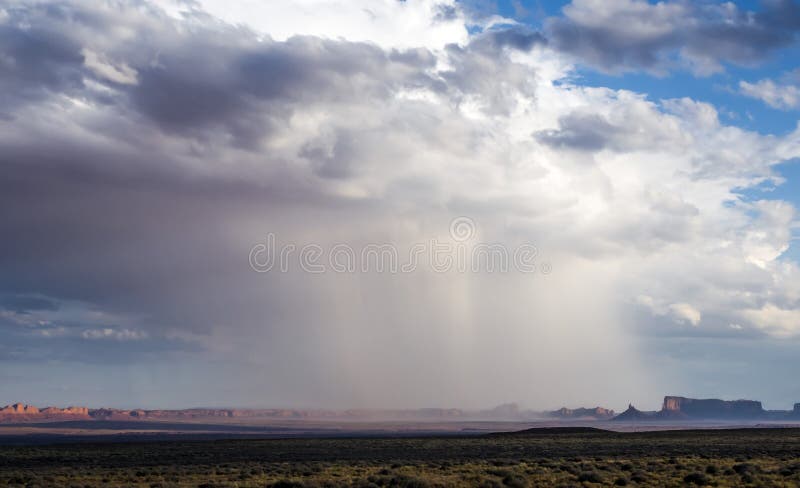 Isolated rainstorm at the Monument Valley with - View from US Hwy 163, Monument Valley, Utah