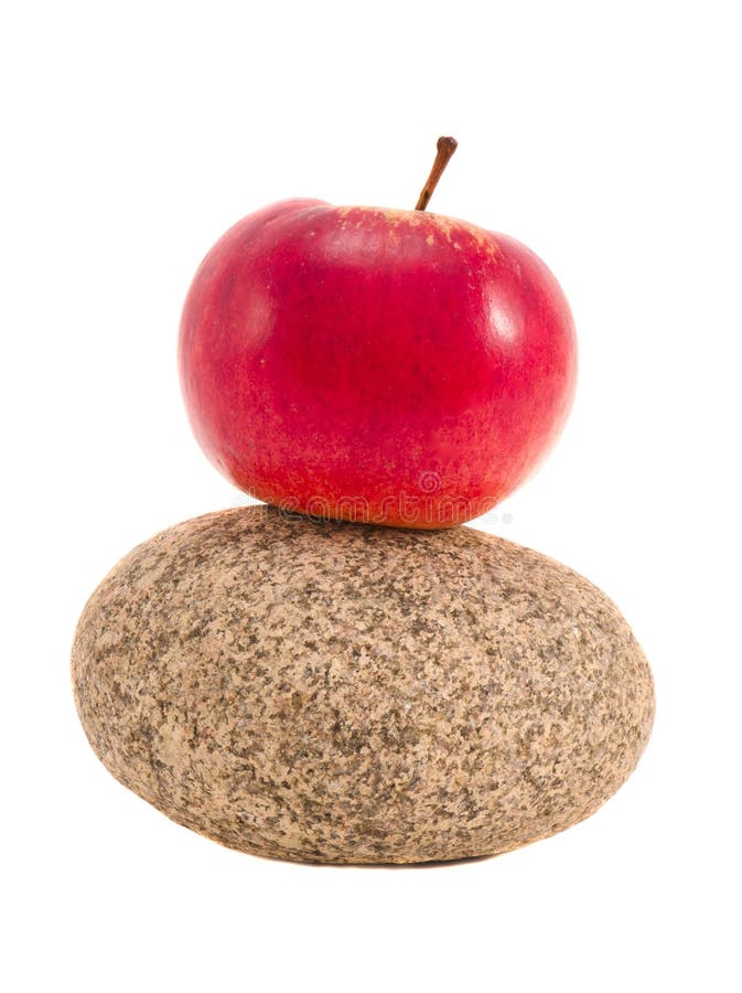 Isolated stone with red apple