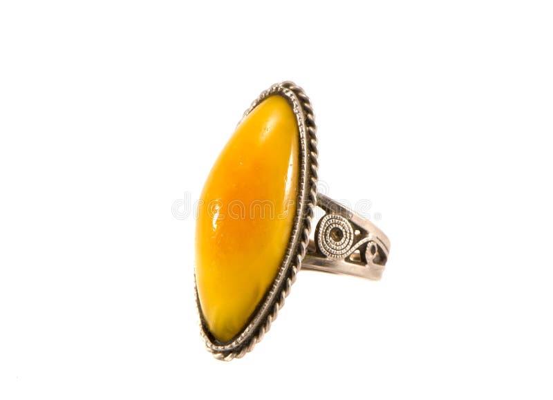 Isolated vintage metal ring with amber