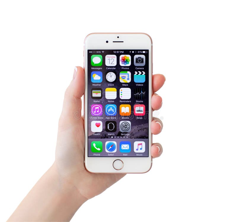 Isolated woman hand holding iPhone 6S Rose Gold