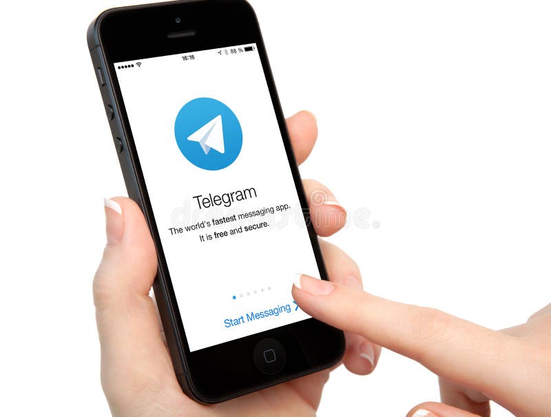 Isolated woman hands holding iPhone with Telegram on the screen