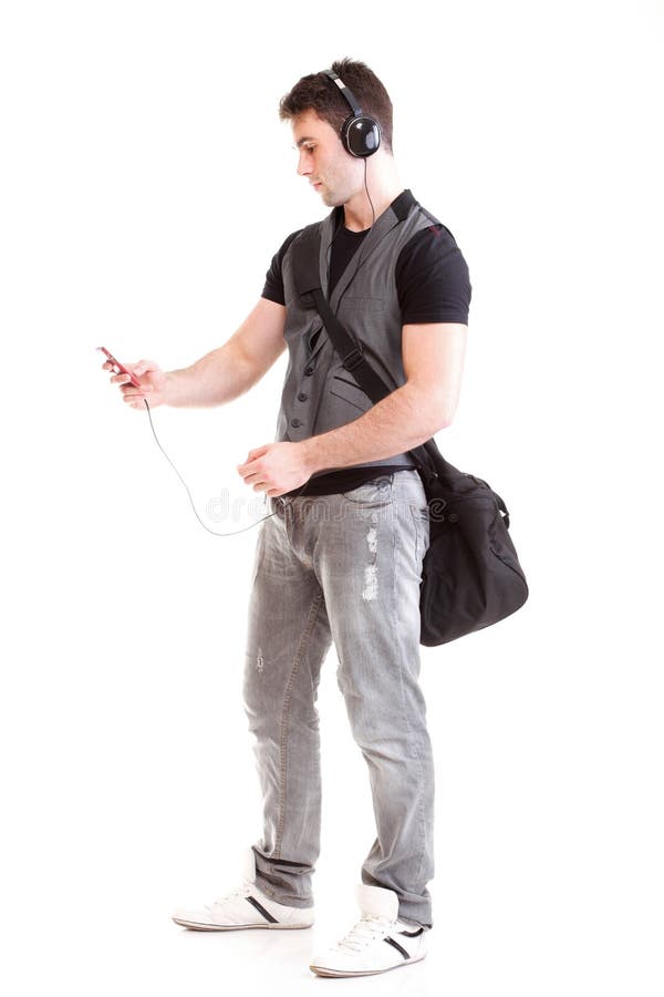 Isolerad full telefon för pojke för skola för musik för längdståendeheadphone royaltyfria bilder