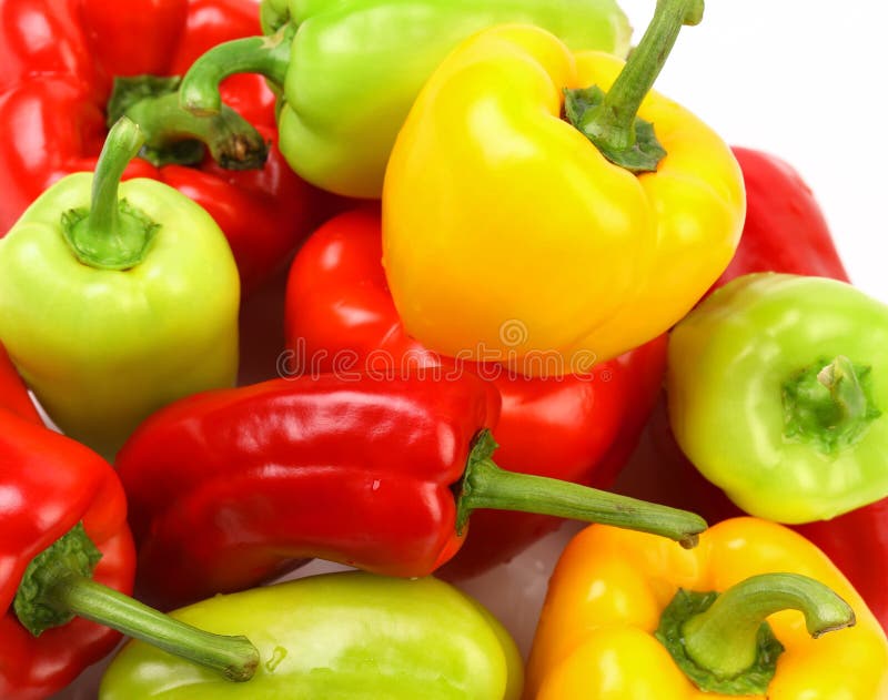 Isolerad samling av kulör paprika royaltyfri bild Isolerad samling av kulör paprika royaltyfri bild