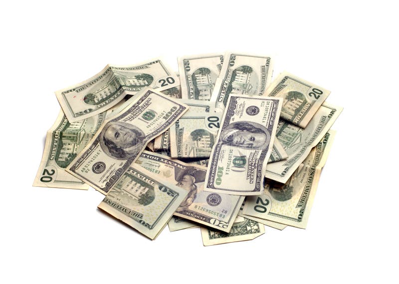 A pile of American dollars isolated against a white background. A pile of American dollars isolated against a white background.