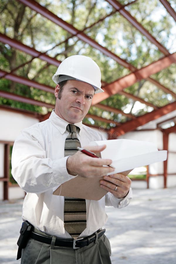 Ispettore della costruzione - scetticismo immagini stock Ispettore della costruzione - scetticismo immagini stock