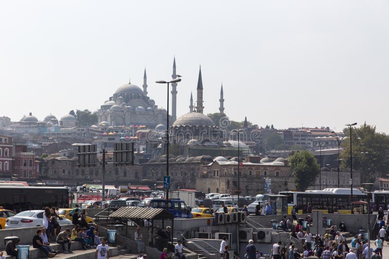 Istanbul Eminonu Square and people walking around in the background Suleymaniye Mosque view stock photos Istanbul Eminonu Square and people walking around in the background Suleymaniye Mosque view stock photos