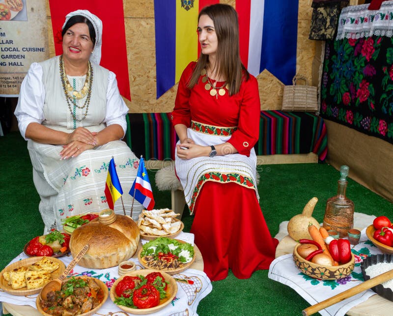 Istanbul 4. Etnospor cultural festival. Two women from Moldova and Gagauz show their food in traditional dresses