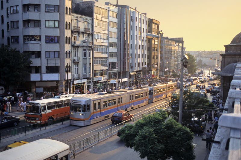 Animated street of european city of Istanbul in evening, with bus, tramway, taxi, cars, pedestrians. Animated street of european city of Istanbul in evening, with bus, tramway, taxi, cars, pedestrians.