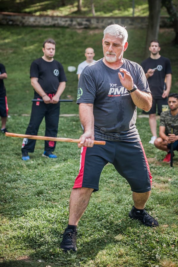 Filipino Martial Arts Instructor Demonstrates Stick Fighting Techniques  Stock Photo - Image of astig, outdoor: 109278684