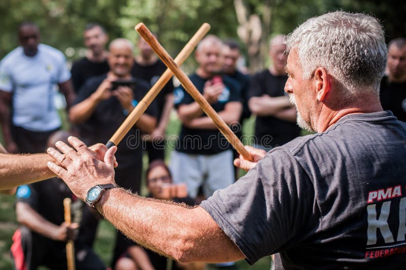 Escrima and kapap instructor demonstrates sticks fighting