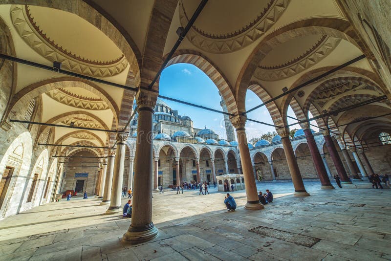 Exterior view of Suleymaniye Mosque through arches in its courtyard