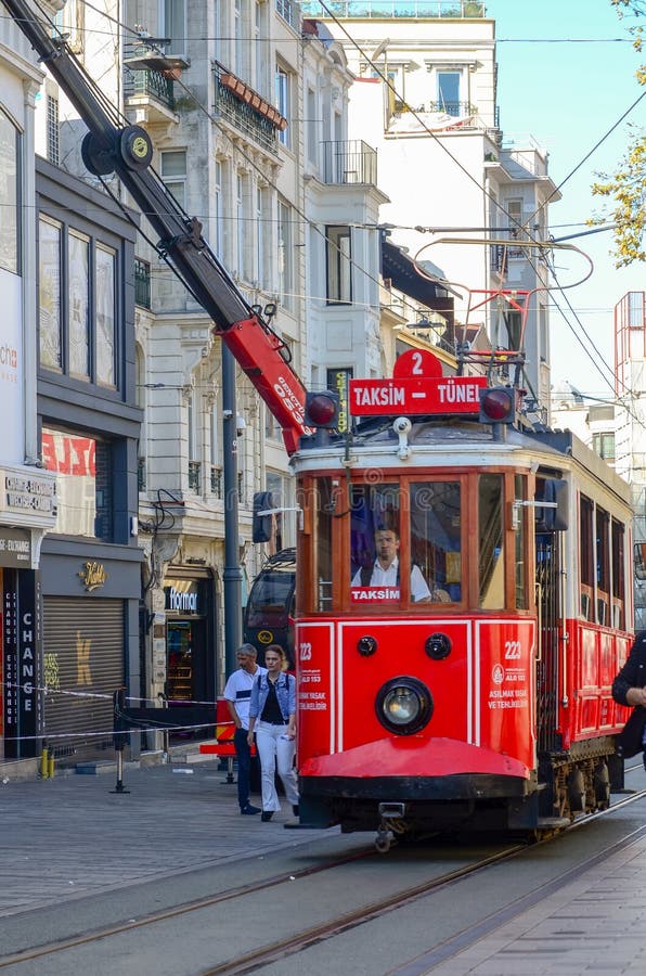 Istanbul, TURKEY, September 18, 2018. Red retro tram rides along the busy Istiklal street in Istanbul royalty free stock images Istanbul, TURKEY, September 18, 2018. Red retro tram rides along the busy Istiklal street in Istanbul royalty free stock images