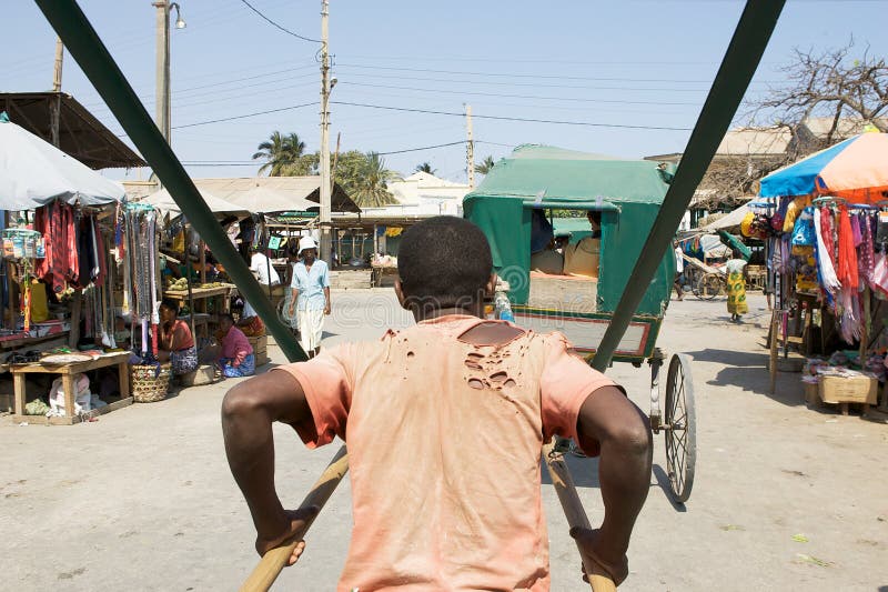 Human-powered taxi vehicle in the island of Madagascar. The standard of living of the Malagasy population has been declining dramatically over the past 25 years. Despite a wealth of abundant and diverse natural resources, Madagascar is one of the worldâ€™s poorest countries. Madagascar holds great potential for agricultural development, mainly due to the large variety of soil types and climatic diversity. Nevertheless, natural hazards combined with old-fashioned farming practices limit the production. Human-powered taxi vehicle in the island of Madagascar. The standard of living of the Malagasy population has been declining dramatically over the past 25 years. Despite a wealth of abundant and diverse natural resources, Madagascar is one of the worldâ€™s poorest countries. Madagascar holds great potential for agricultural development, mainly due to the large variety of soil types and climatic diversity. Nevertheless, natural hazards combined with old-fashioned farming practices limit the production.