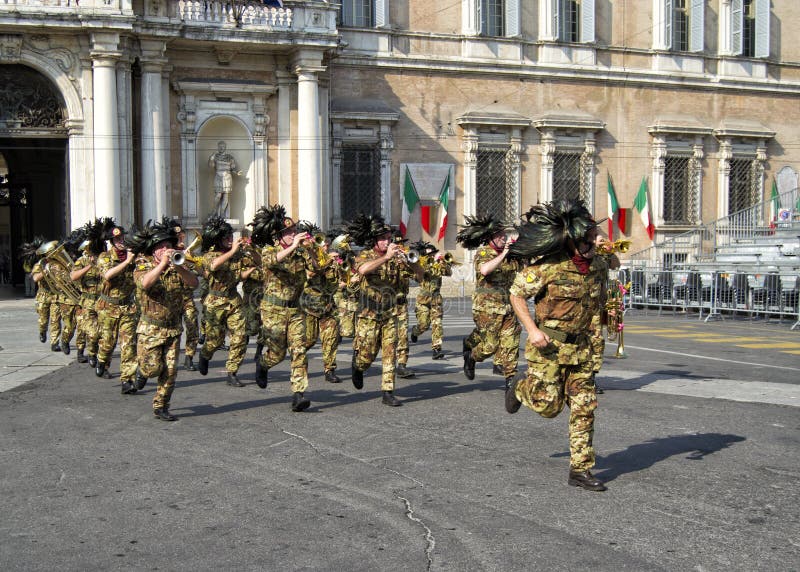 Italian Army Bersaglieri Fanfara running in Modena during military tattoo in front of the Italian Military Accademy