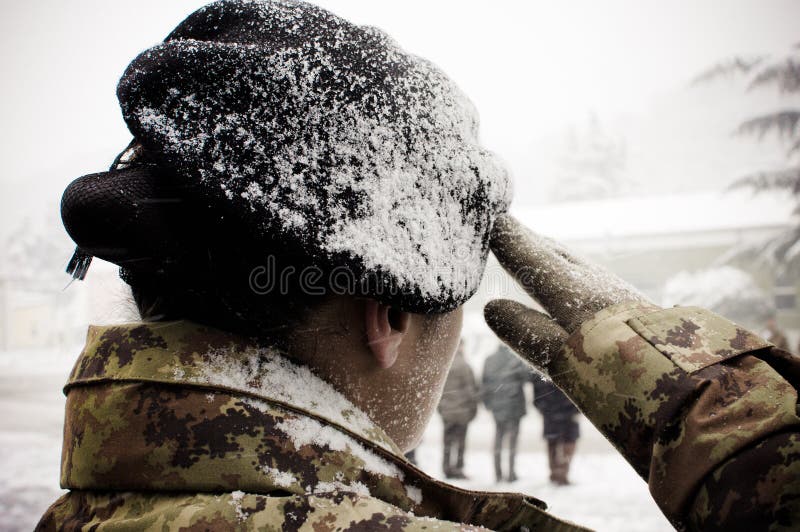 Italian army woman under the snow