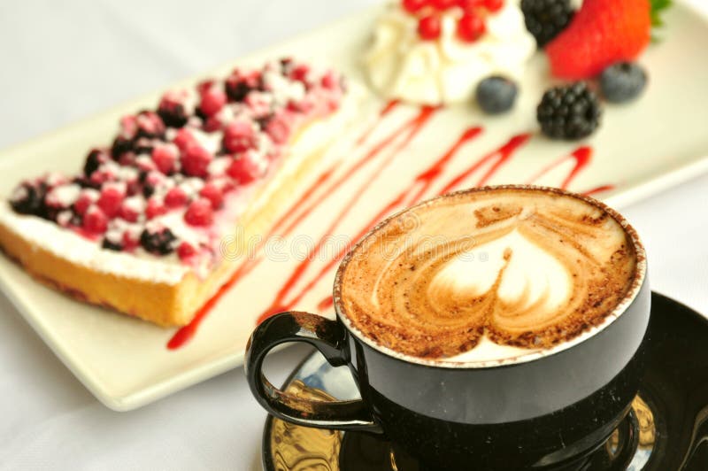 Italian breakfast with cappuccino and fruit cake