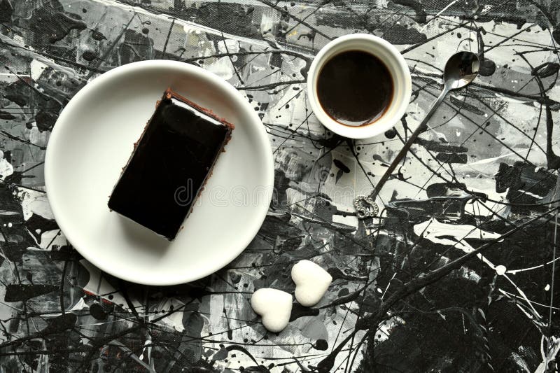 Italian breakfast with coffee and chocolate cake