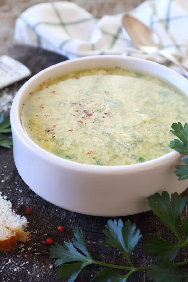 Italian Cuisine. Stracciatella Soup Parsley, Eggs and Parmesan Cheese