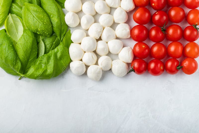 Italian Flag Made with Tomato Mozzarella and Basil. the Concept of