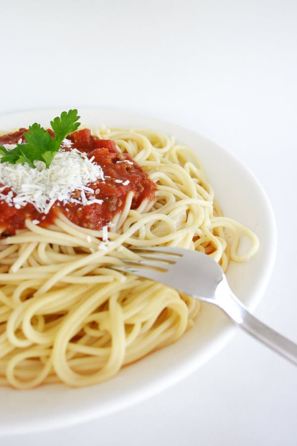 Italian food. Spaghetti Napolitana with fork Italian food. Spaghetti Napolitana with fork