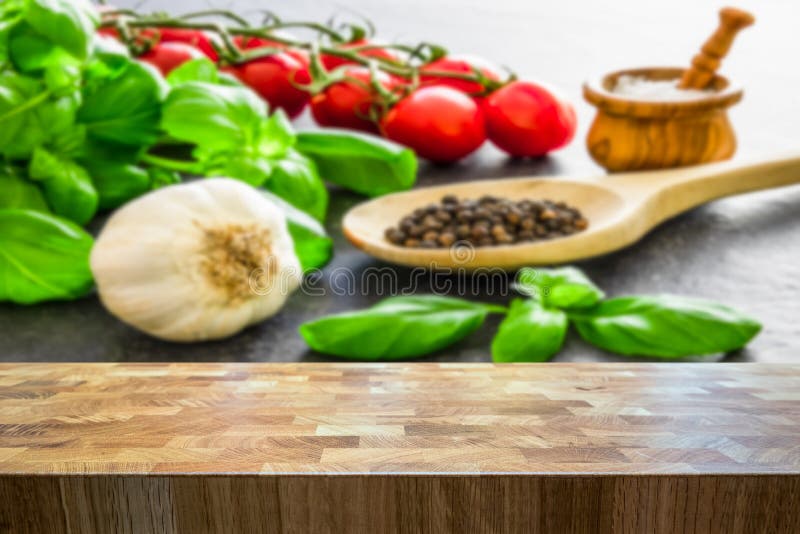 Italian food ingredients. Herbs and seasoning spices blurred in the background stock images Italian food ingredients. Herbs and seasoning spices blurred in the background stock images