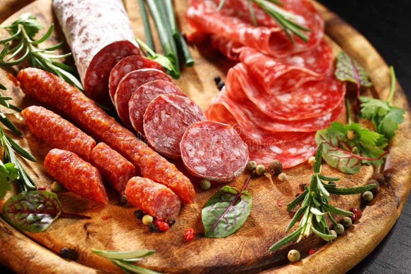 Italian ham and salami with herbs royalty free stock image Italian ham and salami with herbs royalty free stock image