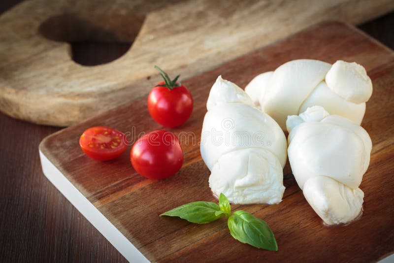 Italian mozzarella cheese stock image. Image of cream 77341915