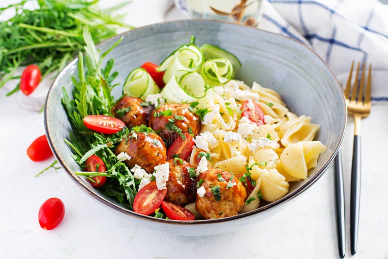 Conchiglie with Meatballs, Feta Cheese and Salad on Light Background ...