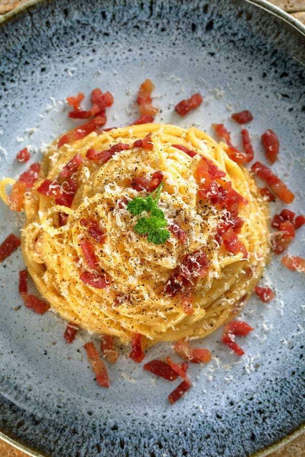 Italian pasta with eggs and bacon stock image