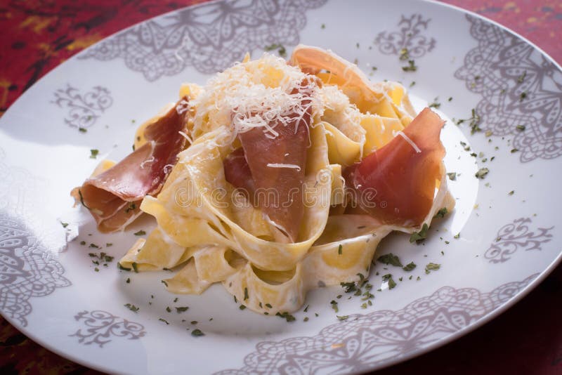 Italian pasta with prosciutto stock photography Italian pasta with prosciutto stock photography