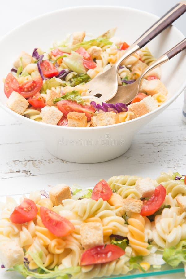 Italian Pasta Salad with Tomatoes Stock Image - Image of durum, plate