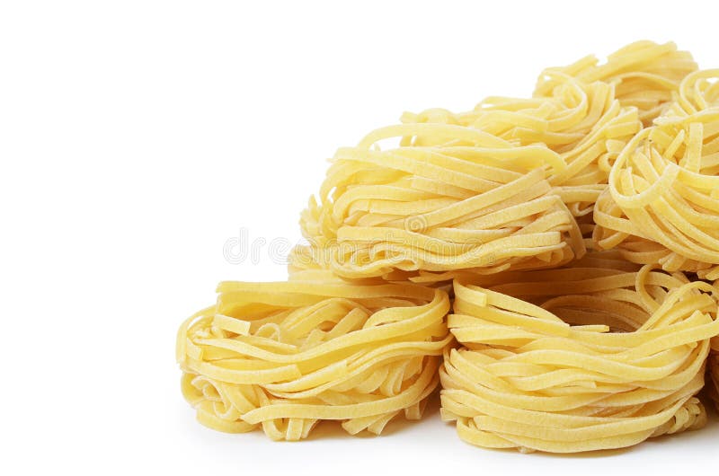 Italian pasta tagliatelle nest isolated on white background