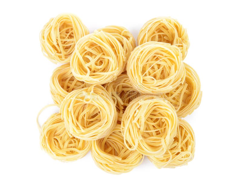 Italian pasta tagliatelle nest isolated on white background