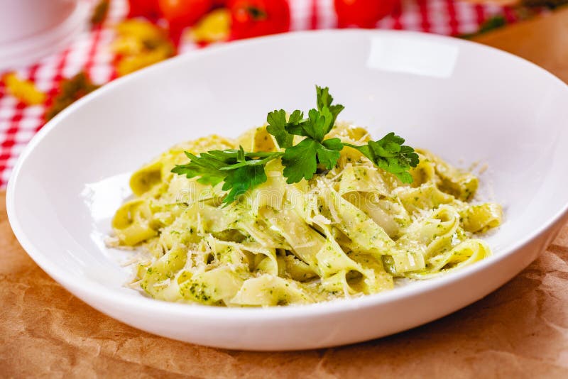 Italian Pasta Tagliatelle with Pesto Sauce and Parmesan Cheese on White ...