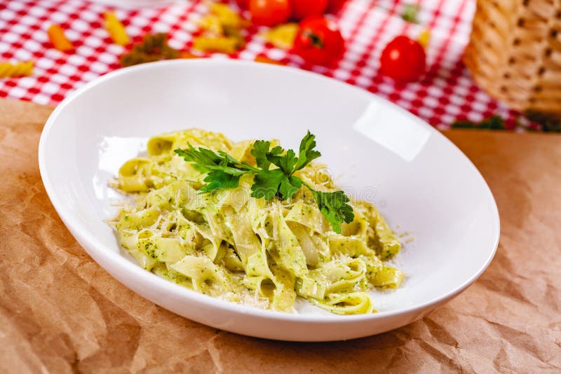 Italian Pasta Tagliatelle with Pesto Sauce and Parmesan Cheese on White ...